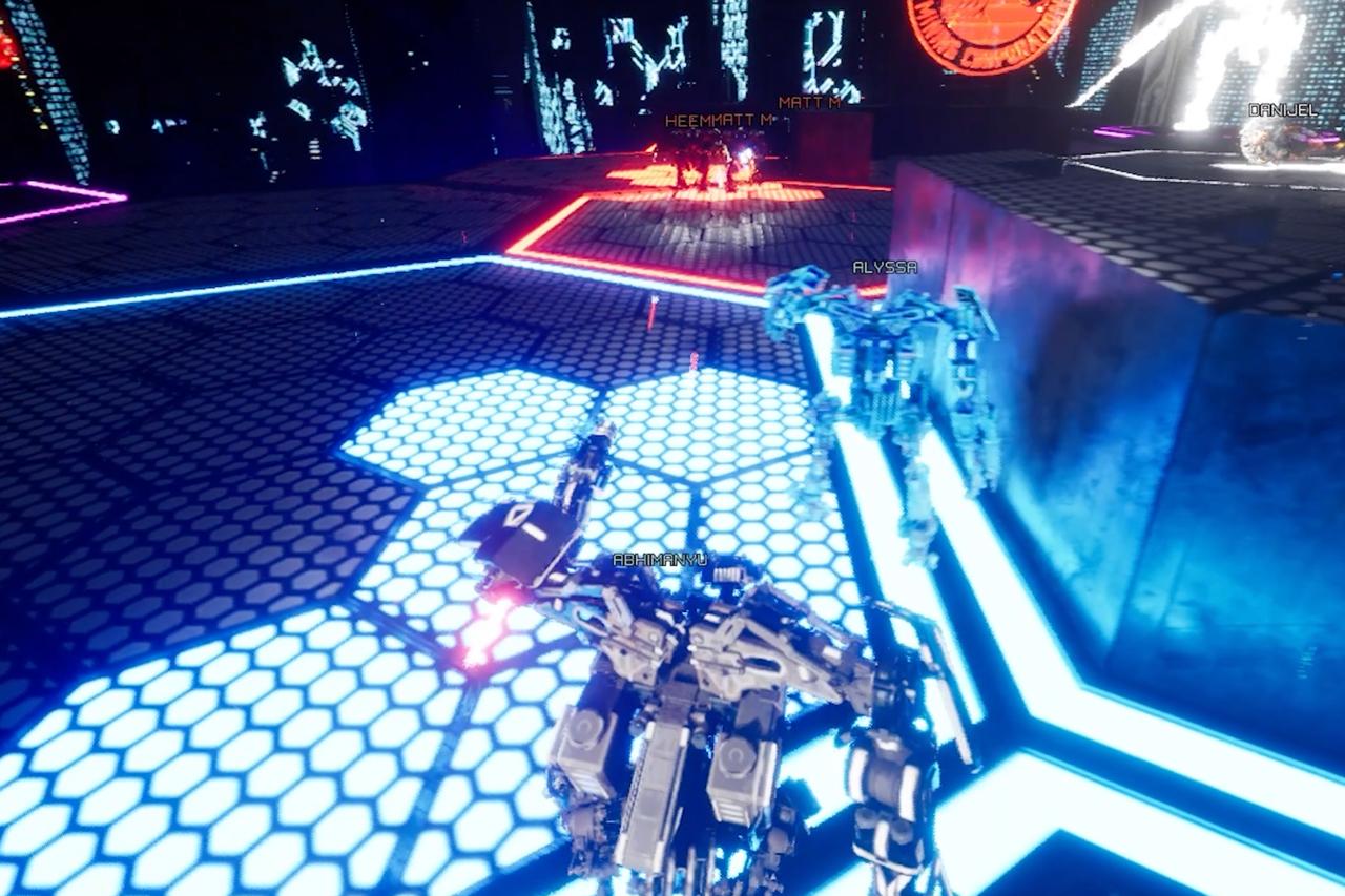 Mechs on the lit hex floor of the arena, every machine carrying its owner's name